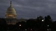 The US Capitol is lit under dark clouds on the morning of October 7.