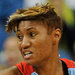 Angel McCoughtry, defended by Minnesota’s Maya Moore, left, and Seimone Augustus.