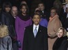 President Barack Obama pauses with his family at the top of the stairs of the U.S. Capitol after at the ceremonial swearing-in during the 57th Presidential Inauguration in Washington