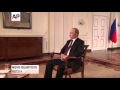 AP Interview: Putin Warns West on Syria Action