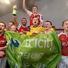 St. Patrick's Athletic players celebrate in their team dressing room at the end of the game