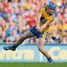 Shane O'Donnell shoots to score his side's second goal in the All-Ireland Hurling Final Replay.