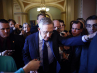 Senate Majority Leader Harry Reid of Nevada leaves the Senate floor to meet with Democratic Senators on Capitol Hill in Washington on Saturday, Oct. 12, 2013. (Photo by Charles Dharapak/AP)