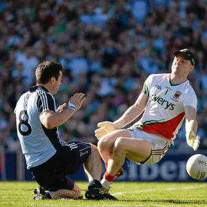 Mayo goalkeeper Robert Hennelly saves a goal-bound shot from Dublin's Michael Darragh Macauley at Croke Park yesterday