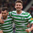 Celtic's Charlie Mulgrew celebrates his goal against Raith Rovers with Joe Ledley