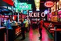 Vintage neon and tin signs feature at Fat Bob's Bar and Grill.