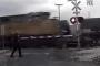 Fleeing driver survives two-train hit