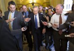 Senate Majority Leader Sen. Harry Reid, D-Nev., is surrounded by reporters after leaving the office of Senate Minority Leader Sen. Mitch McConnell, R-Ken., on Capitol Hill on Monday, Oct. 14, 2013 in Washington.