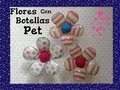 FLORES HECHAS CON BOTELLAS  PET CUBIERTAS CON TELA .- PET FLOWERS