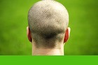 Man's Head from Behind on Green Background
