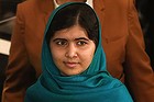 NEW YORK, NY - OCTOBER 10:  Malala Yousafzai appears before photographers before an interview with CNN's Christiane Amanpour on October 10, 2013 in New York City. The Pakistani girl was shot in the head and neck in 2012 in Pakistan's Swat Valley by the Taliban for her activism for women's rights and education.  (Photo by John Moore/Getty Images)