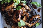 Barbecue chicken wings with spicy tomato sauce.