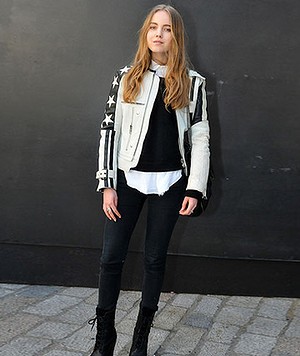 LONDON, UNITED KINGDOM - FEBRUARY 18: Alexandra Carl, Stylist for ID mag, Elle Mag, and Rika mag wears a two tone mod inspired Acne leather biker jacket, white Acne shirt, Acne leggings, and Acne boots at London Fashion Week Fall/Winter 2013/14 on February 18, 2013 in London, England. (Photo by Catherine Farrell/FilmMagic)