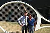 Brisbane Lord Mayor Graham Quirk hits up Steve “Stefan” Ackerie for the original giant tennis racket that was a feature at the old Milton Tennis Centre.