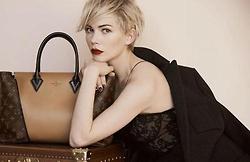 Michelle Williams for Vuitton and a handbag that charges your phone