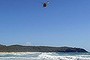 A helicopter searches for a man who went missing at Noosa.