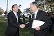 Opposition Leader Tony Abbott greets Liberal MP John Alexander during a NSW Business chamber breakfast, in North Ryde,Sydney.