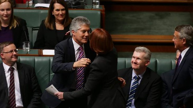 Labor MP Stephen Smith is congratulated by former prime minister Julia Gillard  after delivering his valedictory speech in the House of Representatives  on Thursday.