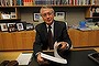 Treasurer Wayne Swan poses for the media with the 2013 Budget at Parliament House Canberra.