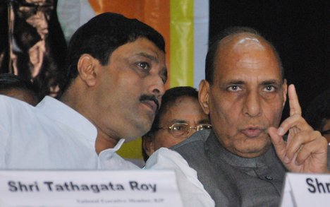 India BJP President Rajnath Singh garlanded by his party worker during Panchayat Samelan in Kolkata on Monday 11 march 2013