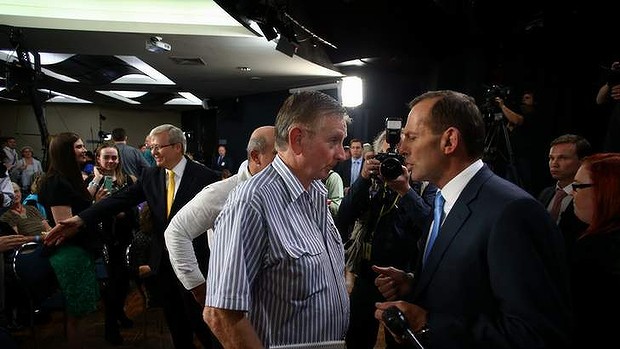 Prime Minister Kevin Rudd and Opposition Leader Tony Abbott meet participants after they attended the People's Forum at the Broncos Leagues Club in Brisbane.