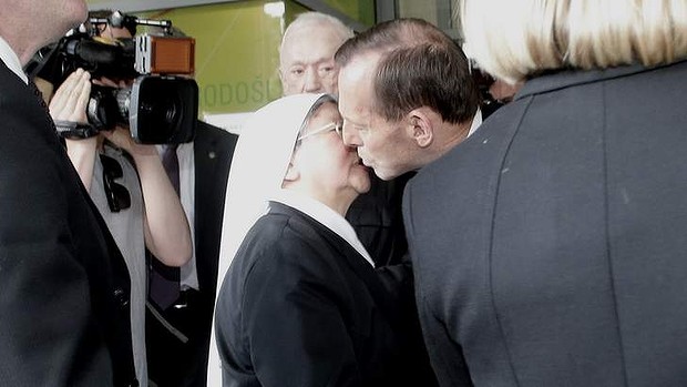 Opposition leader Tony Abbott farewells Sister Jacinta Fong after his visit to St Vincent's Hospital in Sydney on Thursday.