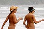 Naked women on nudist beach.