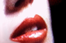 Close-up of a woman's lips, slightly pixelated as if on a CRT TV