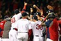 The Boston Red Sox celebrate after defeating the St. Louis Cardinals.