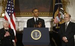 President Barack Obama applauds Federal Reserve Chairman Ben Bernanke as Janet Yellen, vice chair of the Board of Governors of the Federal Reserve System, stands at left in the State Dining Room at the White House in Washington, Wednesday, Oct. 9, 2013.