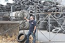 Unlicensed storage and disposal of tyres. Pictured: Unlicensed storage and disposal of tyres.  Pictured: Dave West, national policy director for the Boomerang Alliance at Carbon Polymers, Woodpark Park Road Smithfield.  Photo: Peter Rae Thursday 31 October, 2013.