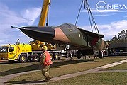 A F-111 is moved from Amberley to the Queensland Air Museum at Caloundra