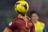 The ball covers the face of Miralem Pjanic during a Serie A match.
