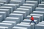 A boy hops from one to another of the 2711 stellae at the Memorial to the Murdered Jews of Europe, also called the Holocaust Memorial.