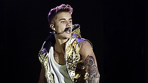 Justin Bieber performs during his 'Believe' world tour in Panama City, Thursday, Oct. 24, 2013. (AP Photo/Arnulfo Franco)