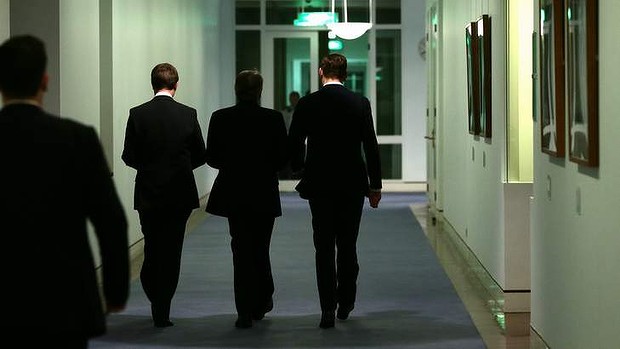 Wayne Swan leaves his press conference on Wednesday night.