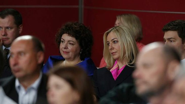 Therese Rein and Jessica watch the community forum at Rooty Hill RSL in Sydney on Wednesday.