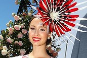 MELBOURNE, AUSTRALIA - NOVEMBER 05:  Chloe Moo, daily winner of Fashions on the Field poses, during Melbourne Cup Day at Flemington Racecourse on November 5, 2013 in Melbourne, Australia.  (Photo by Lisa Maree Williams/Getty Images for the VRC)