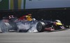 Red Bull driver Sebastian Vettel, of Germany, breaks during a free practice at the Interlagos race track in Sao Paulo, Brazil