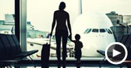 Image: Mother & son at airport (© Ryan Lane/Getty Images)