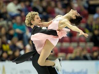 Ice dancers Meryl Davis and Charlie White of the United States skate their short dance at Skate America 2013 in Detroit, Michigan, October 18, 2013.  ...