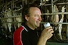 Timboon Dairy Farmer Nic Renyard samples some of his product during milking today. .  ..Age News Pic taken by John Woudstra March 7 2011.