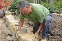 Deciding features: A dry stacked sandstone wall can add instant age and appeal to your garden. Photo: iStock.