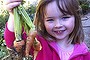 All smiles: Heidi Hodges is happy in the garden, much like her father.