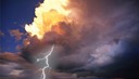 Lightning bolt striking from cloud, Santa Fe, N.M. (© Lyle Leduc/Getty Images)