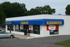 Blockbuster outlet at 3438 Hillsborough Road in Durham, North Carolina. It shares a building with a Frame Shop.