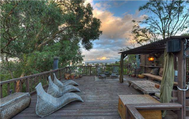 This Hollywood Hills home features multiple decks that have hosted famous guests over the years.