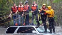 Ventura County Fire Department's swift-water rescue team saving victims, March 2011, Thousand Oaks, Calif. (© Stephen Osman/he Ventura County Star/AP)