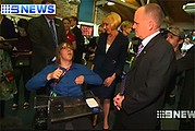 Premier Campbell Newman meets members of the disabled community in Brisbane as agreement is reached on the National Disability Insurance Scheme.