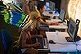 An indigenous child plays with a computer before the visit of Brazilian sport minister Aldo Rebelo at the XIIth games for Indigenous people, at the Botanic Garden in Cuiaba, Mato Grosso state, on 13 November, 2013 Brazil. 1500 natives from 49 Brazilian ethnic groups and from another 17 countries are gathering in Cuiaba until November 16 to compete in some 30 athletic disciplines, many of their own.   AFP PHOTO / Christophe Simon